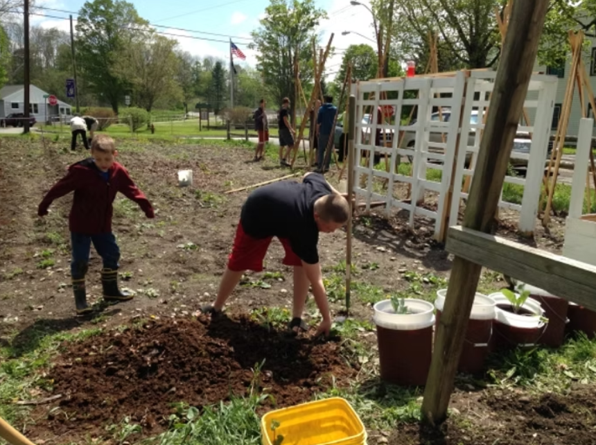 Children gardening in Lisle Community Garden